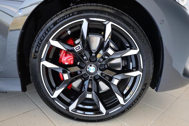 BMW 3-SERIE Touring 330e M Sportpakket Pro | Panoramadak | Elektr. Trekhaak | BMW Individual Dravit Grau Metallic