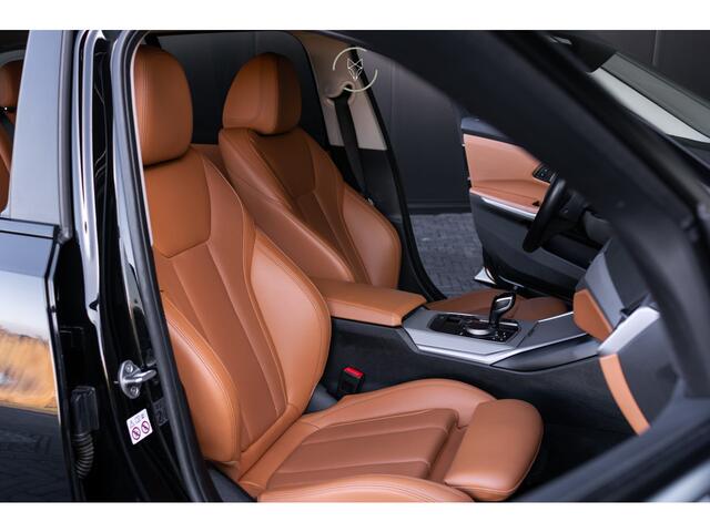 BMW 3-SERIE Touring 330e Advanced Keyless|Assistentiepakket|Sportstoelen|HUD|18"|Live Cockpit Pro|Hifi|Leder|LED