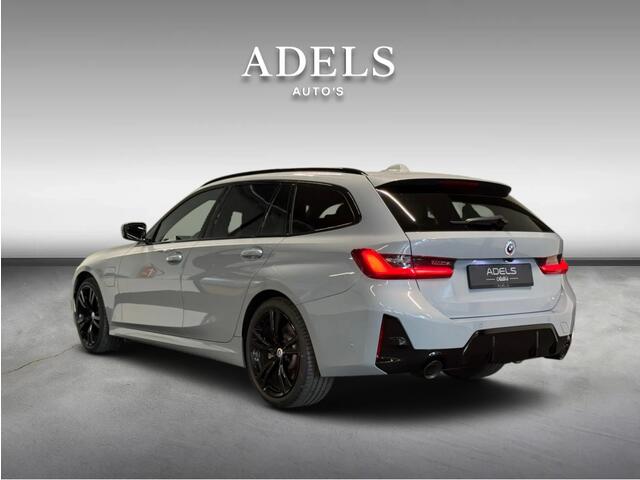 BMW 3-SERIE Touring 330e xDrive M Sport Panodak HUD Trekhaak Harman Kardon Camera ACC Brooklyngrau