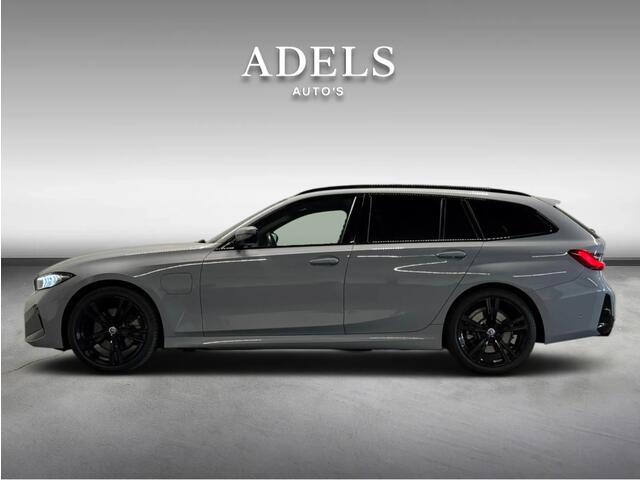BMW 3-SERIE Touring 330e xDrive M Sport Panodak HUD Trekhaak Harman Kardon Camera ACC Brooklyngrau
