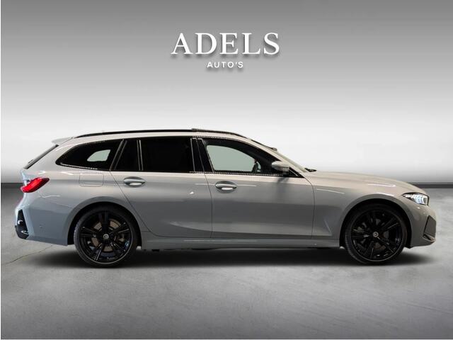 BMW 3-SERIE Touring 330e xDrive M Sport Panodak HUD Trekhaak Harman Kardon Camera ACC Brooklyngrau
