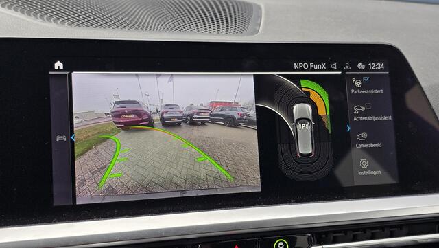 BMW 3-SERIE Touring 330e High Executive | Automaat | Harman & Kardon | HUD | 1/2 Leder | PDC | Camera | Keyless