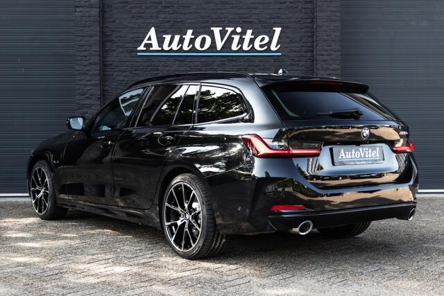 BMW 3-SERIE Touring 330e | Head-Up | Trekhaak | Sportleder | Camera | Comfort Access | Memory