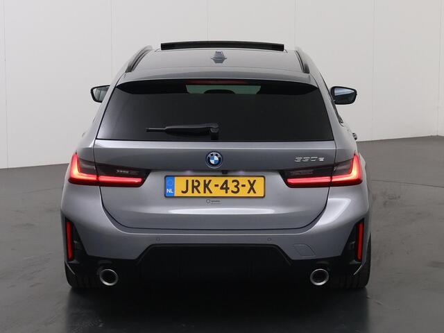 BMW 3-SERIE Touring 330e | M-Pakket | BMW LED | Panormadak | Curved Display | HUD | M-Sportstoelen | Ele.verstelbare stoelen + geheugen | Camera | DAB | Adaptieve Cruise Control | Ele. kofferdeksel |