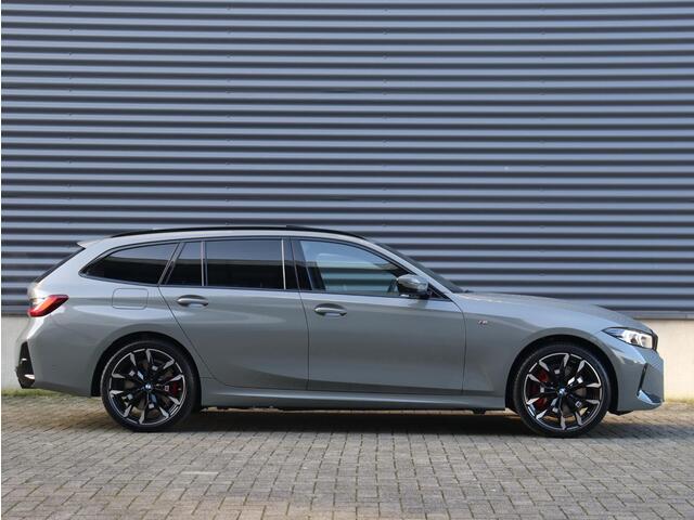 BMW 3-SERIE Touring 330e | M sportpakket Pro | Individual Lak | Innovation Pack | Panodak | Head-Up | Trekhaak | Driving Assistant Prof. | Harman Kardon | Parking Assistant Plus | 19'' LMV