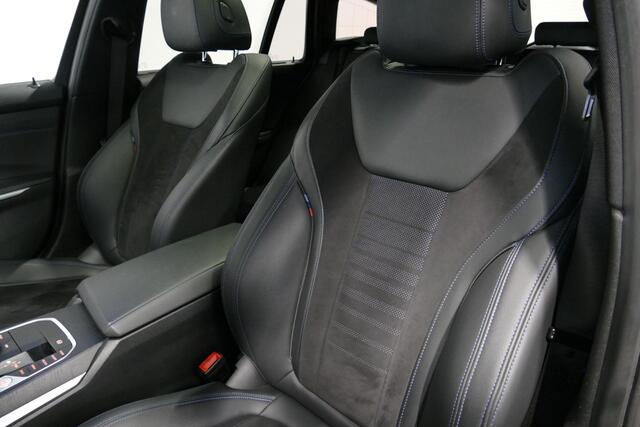 BMW 3-SERIE Touring 330e xDrive M Sport / M340i Diffuser / Black Diamond M grille / M340i M Sport bumper pakket / BMW Laser Light / Panoramadak / Premium kleur Dravitgrau / Elektr. verstelbare voorstoelen links met memory / Apple Carplay - Android Auto / Stoelverwar