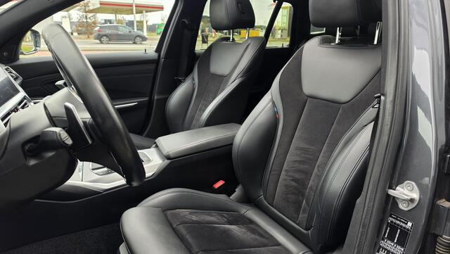 BMW 3-SERIE Touring 330i High Executive | Automaat | Pano | Leder | Stoelverwarming | PDC | Camera | Trekhaak |