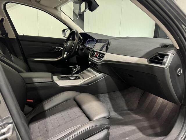 BMW 3-SERIE Touring 320e xDrive Business | panorama | navi | led | trekhaak |