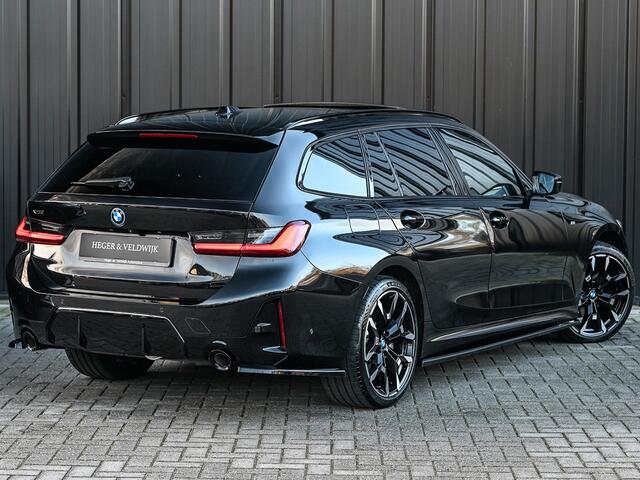 BMW 3-SERIE Touring 330e xDrive M sport | Accu 19,5kWh | Trekhaak | Panorama dak | Active Cruise | Camera | Ambiance interieur
