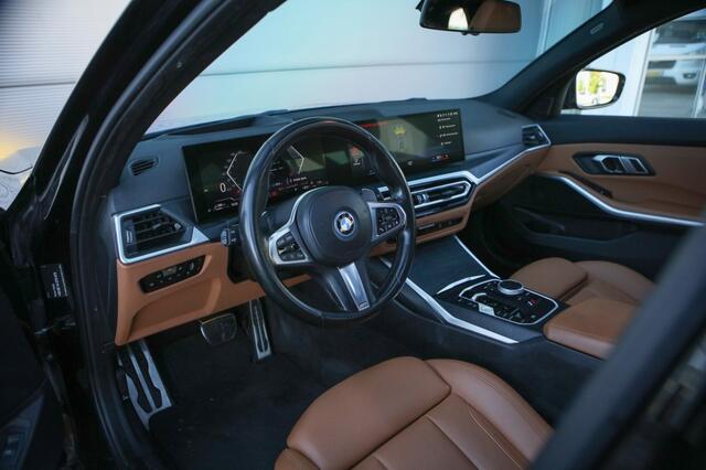 BMW 3-SERIE Touring 330e xDrive M sport | Pano | BTW | Trekhaak | Memory | HUD |