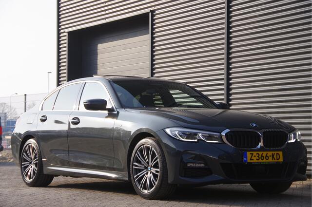 BMW 3-SERIE 330e M-SPORT SCHUIFDAK, INDIVIDUAL LEDER, LASER, HUD, HARMAN/KARDON, ADAPT. CRUISE, SPORTSTOELEN, DRAVIT GRAU