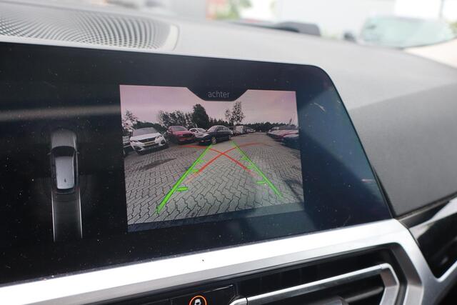 BMW 3-SERIE Touring 320d | Panoramadak | Elek trekhaak | Stoelverwarming | Cruise control