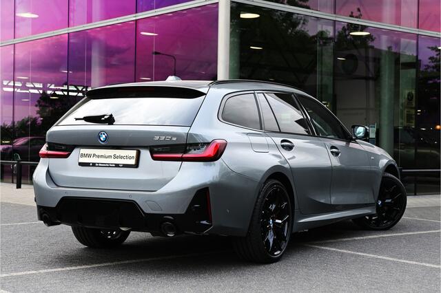 BMW 3-SERIE Touring 330e M Sport Automaat / Panoramadak / Trekhaak / Sportstoelen / Achteruitrijcamera / Comfort Access / Active Cruise Control / Adaptieve LED / Stuurverwarming