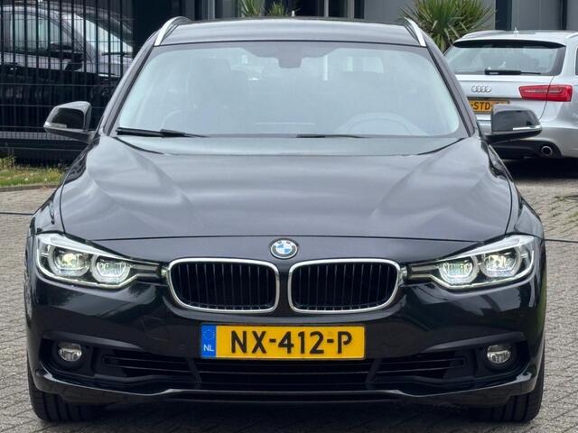 BMW 3-SERIE Touring 320i High Executive Automaat 2017 Zwart Leder