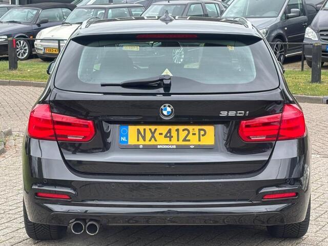 BMW 3-SERIE Touring 320i High Executive Automaat 2017 Zwart Leder