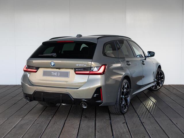 BMW 3-SERIE Touring 330e | Individual Lak | M Sportpakket Pro | Innovation Pack | Comfort Pack | Panoramadak | Trekhaak