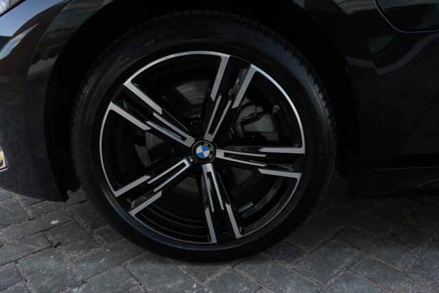 BMW 3-SERIE Touring 330e M Sport High Executive 292pk Navigatie/HUD/360Camera