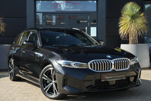 BMW 3-SERIE Touring 330e M Sport High Executive 292pk Navigatie/HUD/360Camera