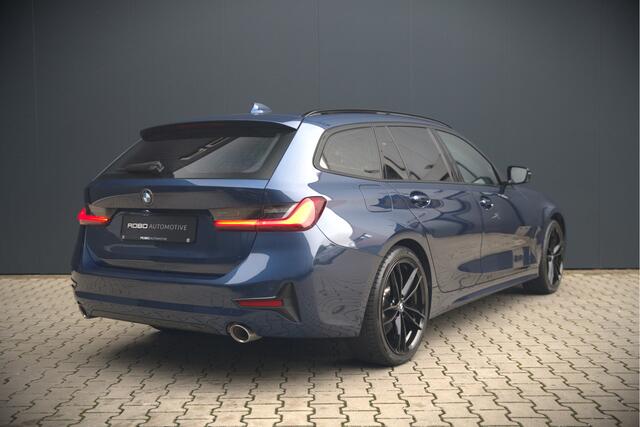 BMW 3-SERIE Touring 330e High Executive Sportline | Keyless | PDC | Leer | Hifi | Ambiance Verlichting | Stoelverwarming | Adaptive Cruise Control | BTW | LED | Shadow Line | Navigatie Prof. | DAB |