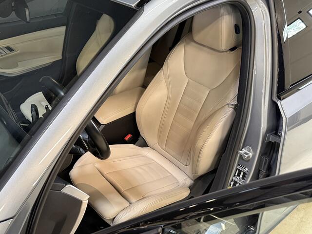 BMW 3-SERIE Touring 330e | M-pakket | Lederen sportstoelen | Harman/Kardon | Sfeerverlichting | Full LED