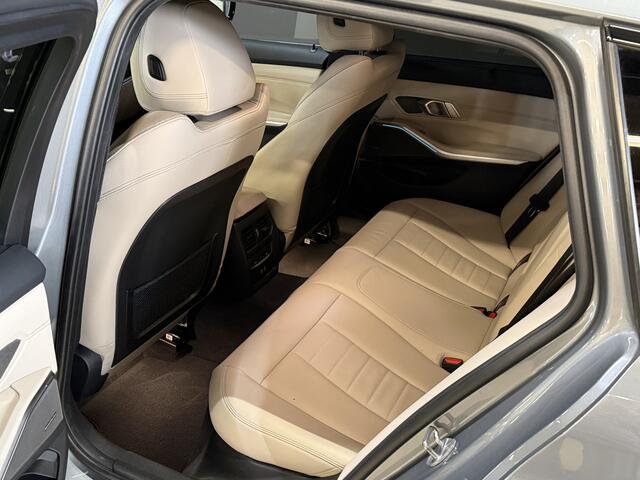 BMW 3-SERIE Touring 330e | M-pakket | Lederen sportstoelen | Harman/Kardon | Sfeerverlichting | Full LED