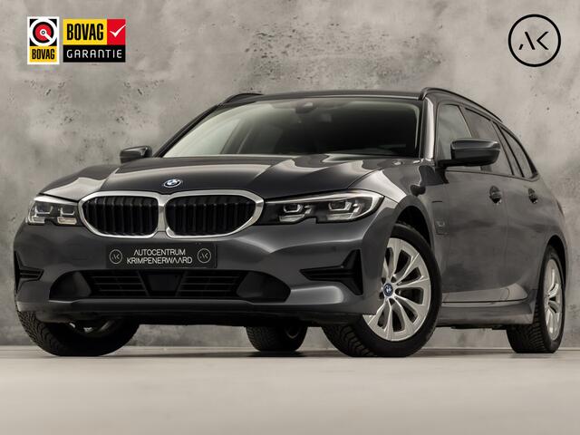 BMW 3-SERIE Touring 320e High Executive 204Pk Automaat (APPLE CARPLAY, DEALER ONDERHOUDEN, GROOT NAVI, CAMERA, LEDER, SPORTSTOELEN, GETINT GLAS, ELEK ACHTERKLEP, NIEUWSTAAT)