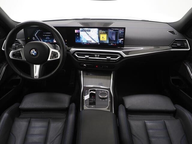 BMW 3-SERIE Touring 320i M Sport Pro Brooklyn Grey | M-sportstoelen | Panoramadak | Harman/Kardon | Carbon | Camera | Memory | Sfeerlicht