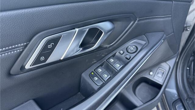 BMW 3-SERIE Touring 320e High Executive PHEV Panoramadak / Sportline pakket / Trekhaak