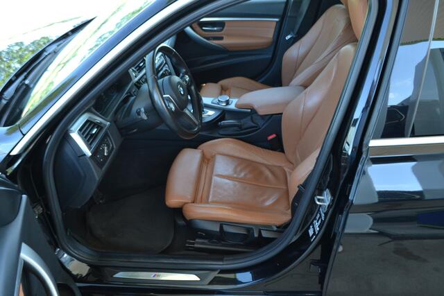 BMW 3-SERIE Touring 318i M Sport Leer | Navigatie | Trekhaak Afn. | onderhoud inzichtelijk.