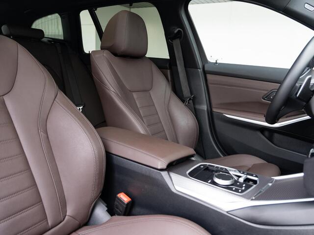 BMW 3-SERIE Touring 320e | M Sportpakket | Travel Pack | 19 inch | Glazen panoramadak | HiFi | Sportstoelen