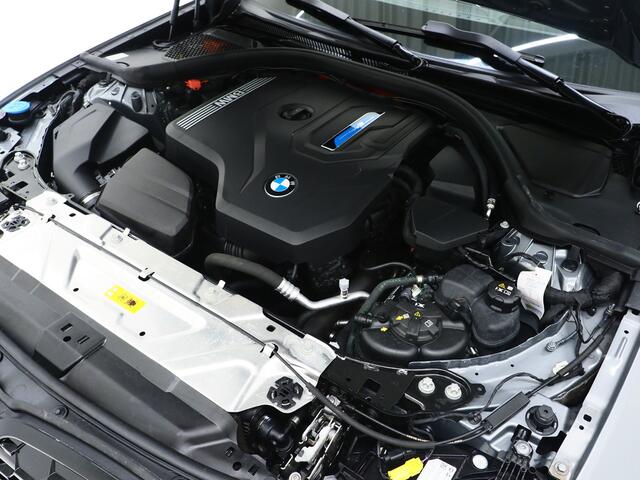 BMW 3-SERIE Touring 320e xDrive LCI Shadowline | Panoramadak | LaserLED | HUD | Adaptive Cruise | 360 | Dodehoek | Carplay
