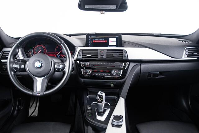 BMW 3-SERIE Touring 318i High Executive M-sport - Panoramadak - Leder - Camera - Navigatiesysteem Professional - HiFi System - Stoelverwarming