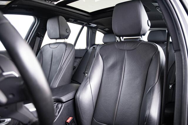 BMW 3-SERIE Touring 318i High Executive M-sport - Panoramadak - Leder - Camera - Navigatiesysteem Professional - HiFi System - Stoelverwarming
