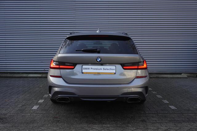 BMW 3-SERIE Touring M340i xDrive High Executive | Parking Pack | Glazen panoramadak | HiFi System | Trekhaak met elektrisch wegklapbare kogel | BMW Head-Up Display | Lentevoordeel