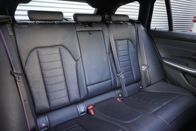 BMW 3-SERIE Touring M340i xDrive High Executive | Parking Pack | Glazen panoramadak | HiFi System | Trekhaak met elektrisch wegklapbare kogel | BMW Head-Up Display | Lentevoordeel