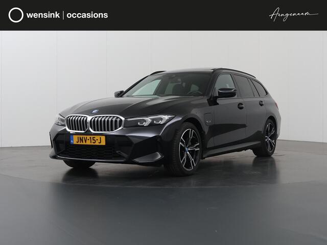 BMW 3-SERIE Touring 320e M-Sport | SOH 97,4% | Facelift | Panoramadak | Elek. Stoelen met Geheugen | HUD | Sportstoelen | 360° Camera | Apple Carplay/Android Auto | Cruise Control | Comfort Pakket | M-Sport Pro | Curved Display |