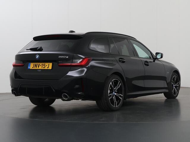BMW 3-SERIE Touring 320e M-Sport | SOH 97,4% | Facelift | Panoramadak | Elek. Stoelen met Geheugen | HUD | Sportstoelen | 360° Camera | Apple Carplay/Android Auto | Cruise Control | Comfort Pakket | M-Sport Pro | Curved Display |