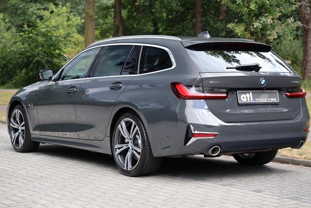 BMW 3-SERIE Touring 330e xDrive High Executive Luxury Line | Pano | Adap Cruise | HUD | Memory | 19 "| Laser | Hifi | Camera | Keyless | Adaptief M onderstel | Stoelverwarming voor & achter | Etc.