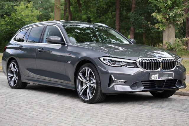 BMW 3-SERIE Touring 330e xDrive High Executive Luxury Line | Pano | Adap Cruise | HUD | Memory | 19 "| Laser | Hifi | Camera | Keyless | Adaptief M onderstel | Stoelverwarming voor & achter | Etc.