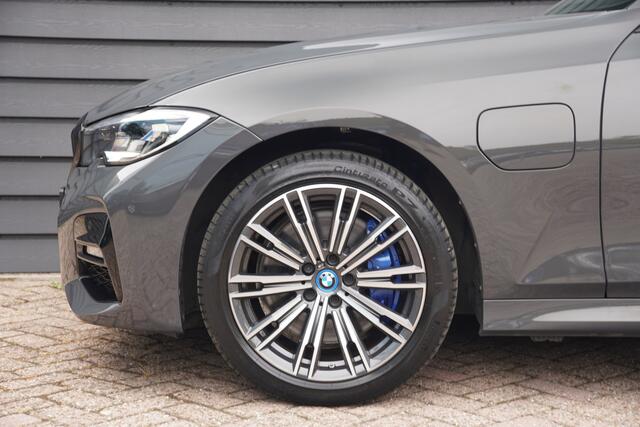 BMW 3-SERIE 320e Business Edition Plus - M SPORT - LASER LED - SCHUIFDAK - LEDER - CARPLAY -