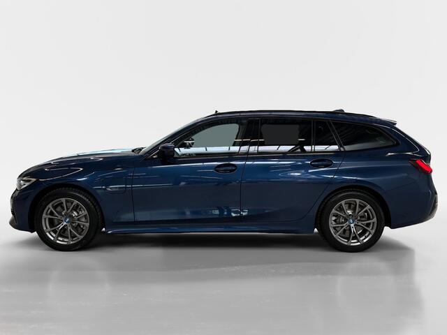 BMW 3-SERIE Touring 330e I Sport Line I Panoramadak I Leder I Cruise I CarPlay I Camera I Elek. achterklep I