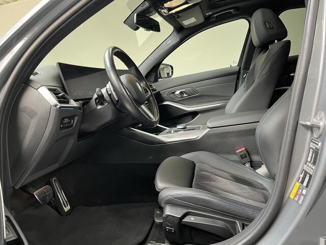 BMW 3-SERIE 320e | M-Sport Pro | Schuif/-kanteldak | Stoelverwarming | 19inch | HiFi | Camera