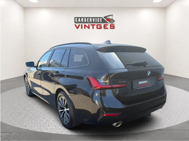 BMW 3-SERIE Touring 318i Sport Edition | Panoramadak | Leder | Trekhaak | Digital Cockpit | CarPlay