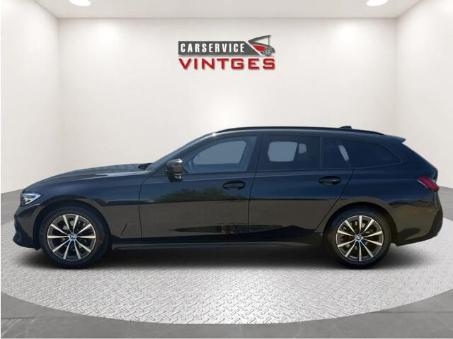 BMW 3-SERIE Touring 318i Sport Edition | Panoramadak | Leder | Trekhaak | Digital Cockpit | CarPlay