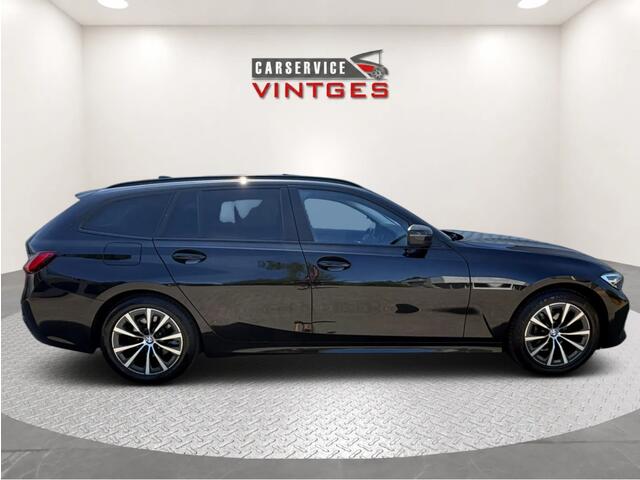 BMW 3-SERIE Touring 318i Sport Edition | Panoramadak | Leder | Trekhaak | Digital Cockpit | CarPlay