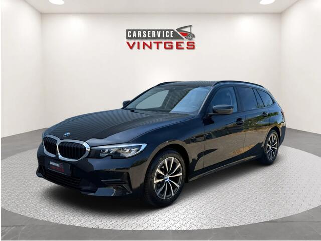 BMW 3-SERIE Touring 318i Sport Edition | Panoramadak | Leder | Trekhaak | Digital Cockpit | CarPlay