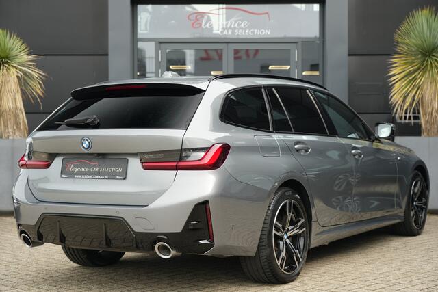 BMW 3-SERIE Touring 330e xDrive M Sport High Executive 292pk Navigatie/HUD/360Camera