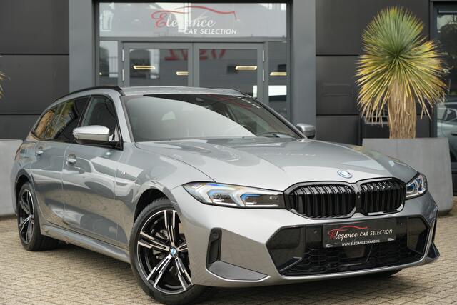 BMW 3-SERIE Touring 330e xDrive M Sport High Executive 292pk Navigatie/HUD/360Camera