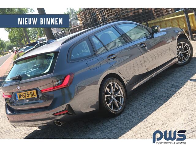 BMW 3-SERIE Touring 318i Business Edition Led / Cruise / Navi / Carplay / PDC / Leer / Clima / NL auto