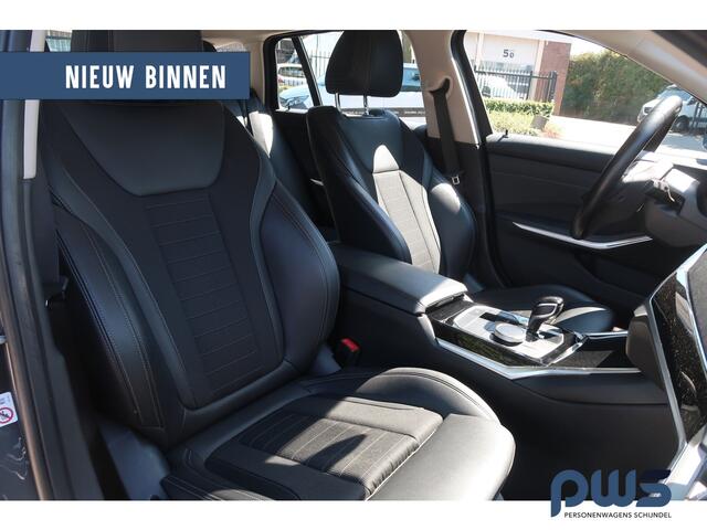 BMW 3-SERIE Touring 318i Business Edition Led / Cruise / Navi / Carplay / PDC / Leer / Clima / NL auto
